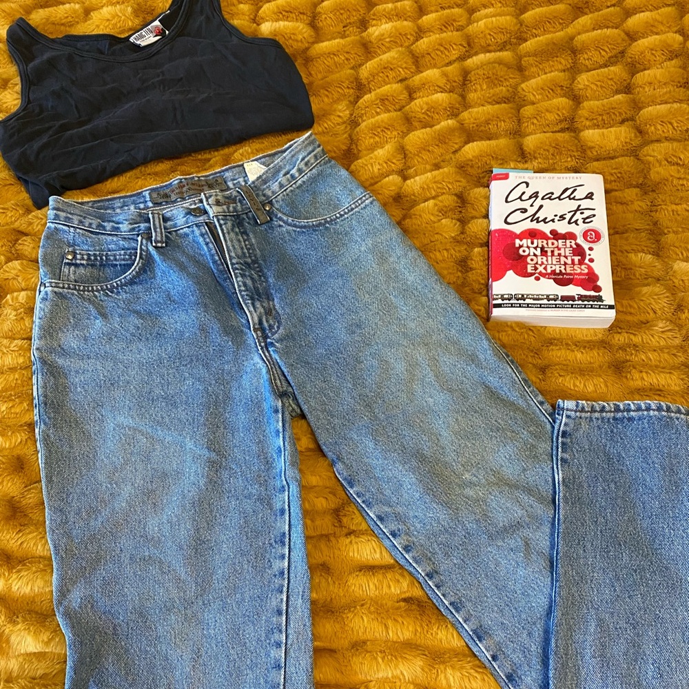 Vintage Levi’s 900 series high-waisted jeans, age distressed.